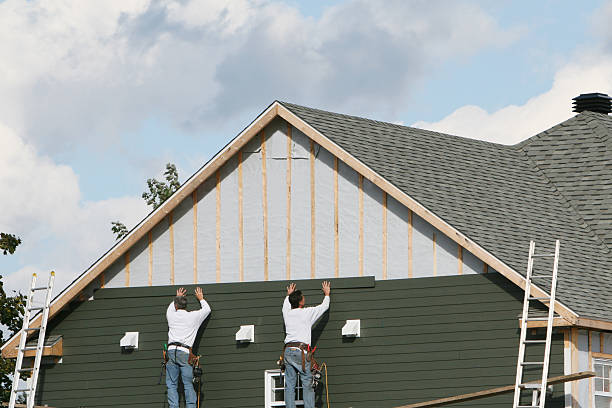 Professional Siding technician working in Camp Hill, PA